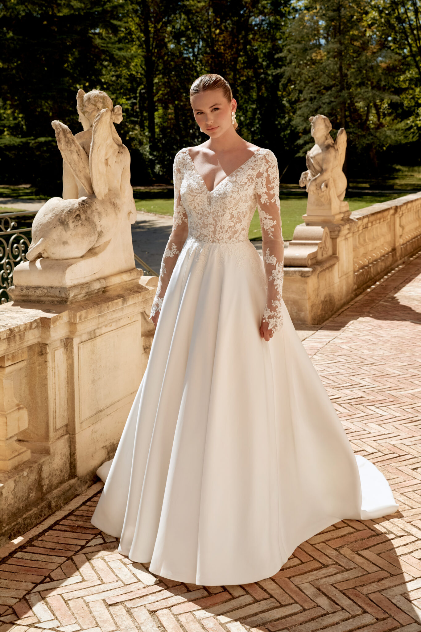 Sincerity by Justin Alexander 44589 trouwjurk met lange illusion mouwen